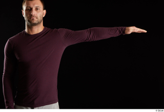 Anatoly  1 arm dressed flexing front view sweatshirt 0003.jpg